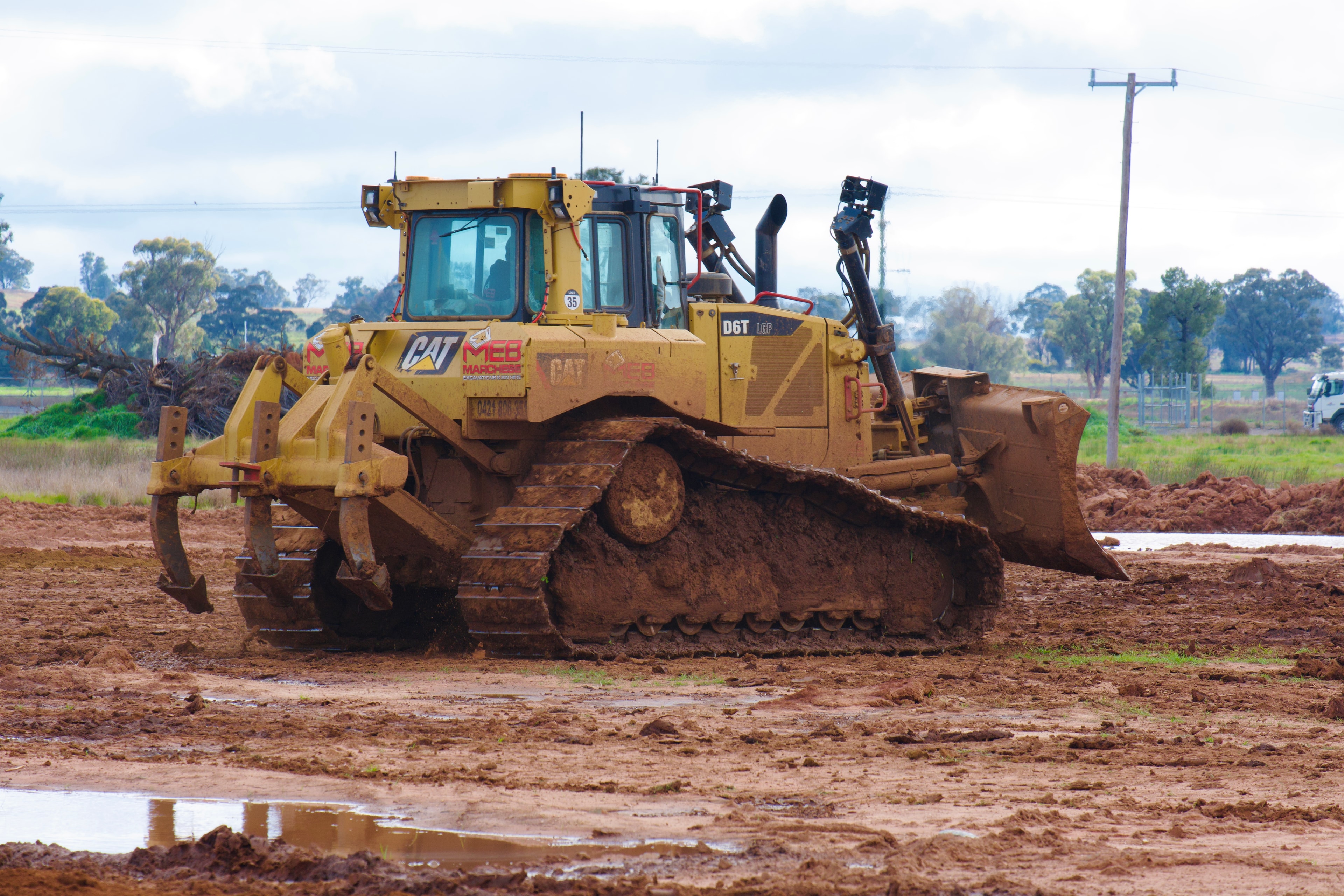 Bulldozer pushing dirt on construction site