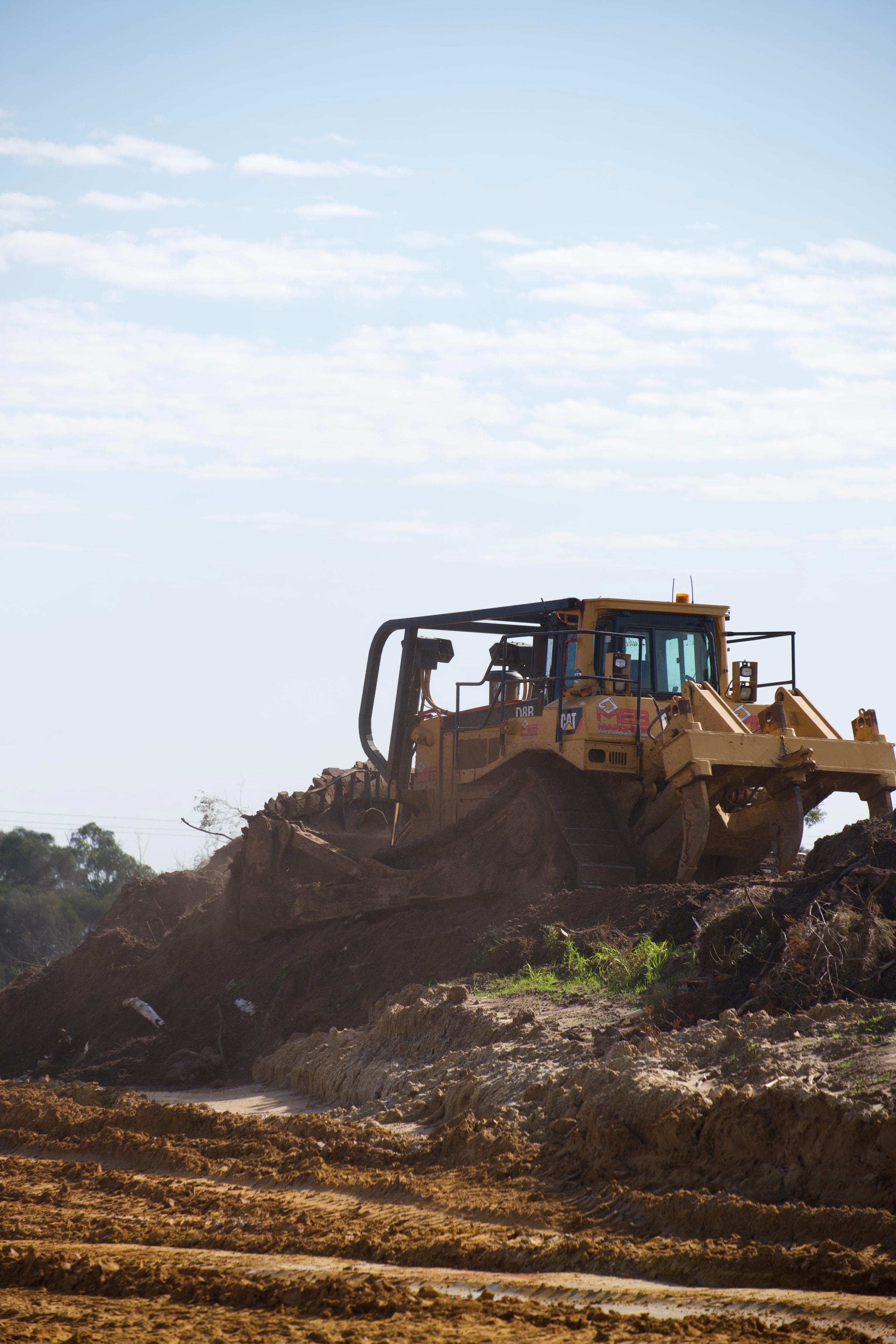 Bulldozer moving earth on construction site