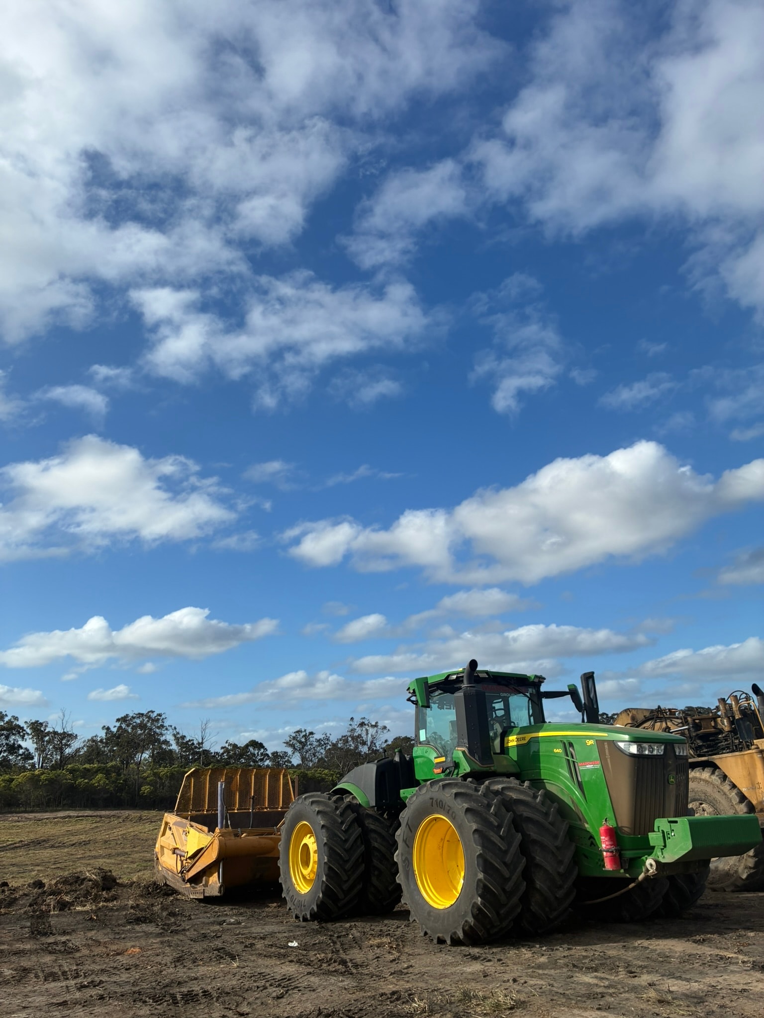 Tractor with hay bale loader
